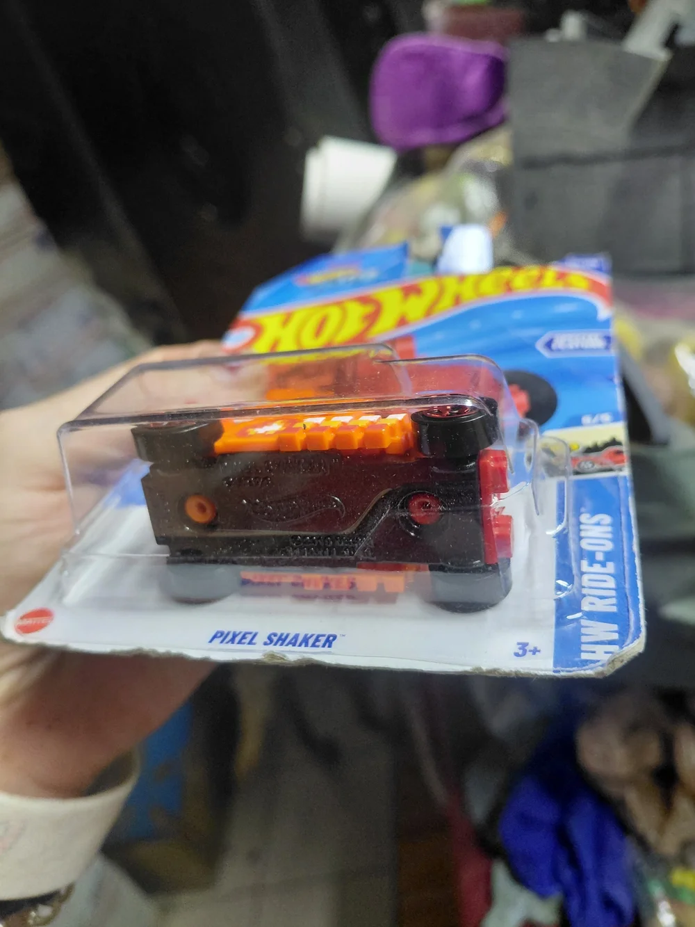 orange Hot Wheels Pixel Shaker diecast car (collector number 138/250, HW Ride-On